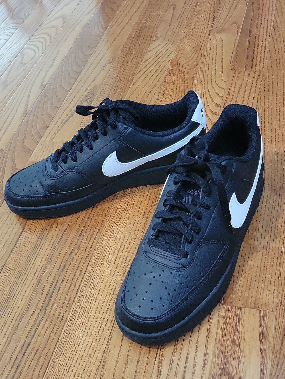 Nike Black Low-Top Court Vision style Sneakers with White Swoosh Accent